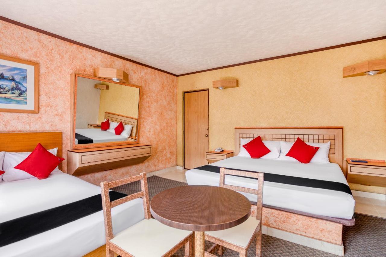 Capital O Hotel Valencia Πουέμπλα Εξωτερικό φωτογραφία